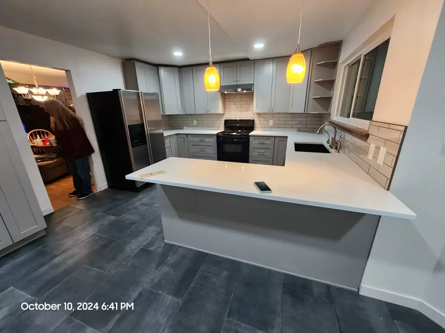 Modern kitchen remodel with a large island in Aurora, Colorado