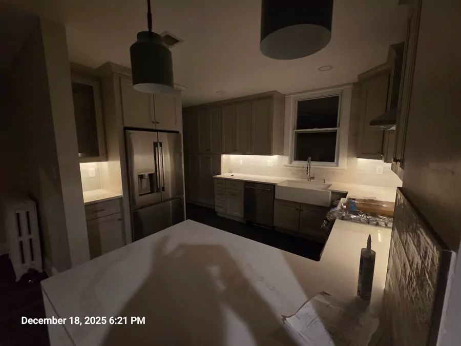Finished Aurora kitchen renovation with durable cabinets and updated lighting